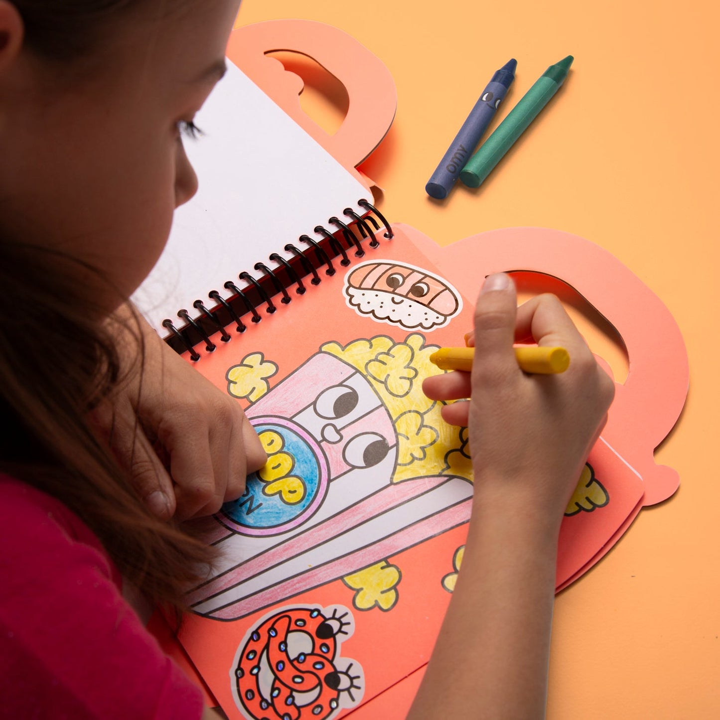 OMY Yummy Coloring & Sticker Book in use